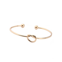 Free Sample IP Plated Gold Tie The Knot Lucky Stainless Steel Cuff Heart Knot Bracelet Bangle